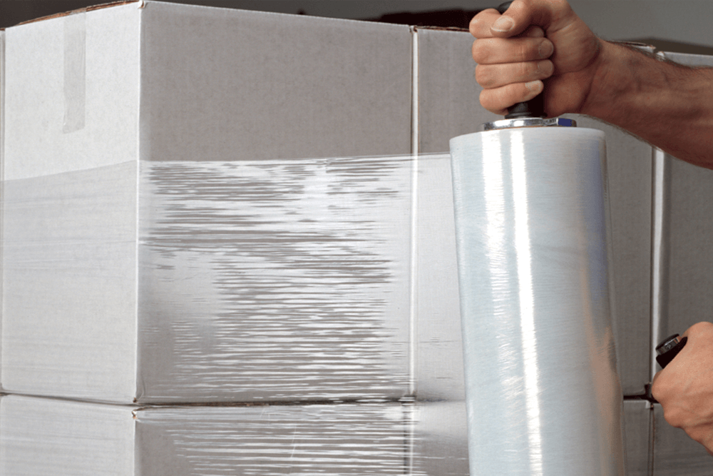 Durable stretch film for secure pallet wrapping.